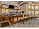 Well-stocked clubhouse bar with seating at 277 Mestre Pl, North Venice, FL 34275