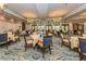 Bright dining room with tables and chairs at 277 Mestre Pl, North Venice, FL 34275