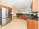 Modern kitchen with stainless steel appliances and ample counter space at 277 Mestre Pl, North Venice, FL 34275