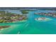 Wide aerial view of waterfront homes and waterways at 5 N Casey Key Rd, Osprey, FL 34229