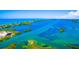 Aerial view of calm ocean water with lush green islands at 5 N Casey Key Rd, Osprey, FL 34229