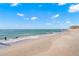 Expansive sandy beach with gentle waves and clear blue sky at 5 N Casey Key Rd, Osprey, FL 34229