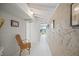 Hallway with ocean view and light-colored walls at 5 N Casey Key Rd, Osprey, FL 34229