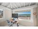 Home office with ocean view and built-in workspace at 5 N Casey Key Rd, Osprey, FL 34229