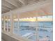 Stunning sunset view over the ocean from a large window at 5 N Casey Key Rd, Osprey, FL 34229