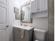 Clean bathroom with vanity, toilet, and medicine cabinet at 8771 Trionfo Ave, North Port, FL 34287