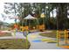 Colorful playground with ramps and shade structures at 8771 Trionfo Ave, North Port, FL 34287