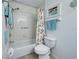 Bathroom with tub, shower, and decorative shower curtain at 1342 Capri Isles Blvd # 14, Venice, FL 34292