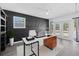 Modern home office with built-in shelving and French doors at 2616 Osage Rd, Venice, FL 34293