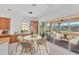 Kitchen with breakfast nook and view of the screened patio at 329 Savona Way, North Venice, FL 34275