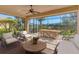 Screened lanai with seating area and outdoor dining space at 329 Savona Way, North Venice, FL 34275