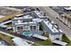 Aerial view of condo complex with pool and parking, near beach at 708 Tamiami S Trl # 308, Venice, FL 34285