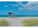 Beachfront view with lifeguard stand and ocean at 708 Tamiami S Trl # 308, Venice, FL 34285