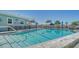 Inviting community pool with ample seating at 708 Tamiami S Trl # 308, Venice, FL 34285