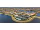 Islandwalk community: aerial view highlighting tennis courts and resort-style pool at 19256 Lappacio St, Venice, FL 34293