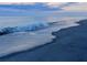 Peaceful beach scene at sunrise with waves at 19256 Lappacio St, Venice, FL 34293