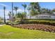 Islandwalk community entrance with landscaped grounds and signage at 19256 Lappacio St, Venice, FL 34293