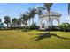 Landscaped seating area with gazebo, offering scenic views at 19256 Lappacio St, Venice, FL 34293