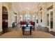 Elegant lobby with comfortable seating and a grand chandelier at 19256 Lappacio St, Venice, FL 34293