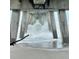 Waves crashing under a pier on a cloudy day at 19256 Lappacio St, Venice, FL 34293