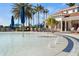 Circular splash pad with bubblers near the pool at 19256 Lappacio St, Venice, FL 34293