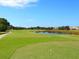 Picturesque golf course with water features and lush greens at 1078 Tuscany Blvd, Venice, FL 34292