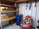 Well-organized workshop with storage shelves and work area at 359 Longwood Dr, Venice, FL 34285