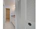 Bright bathroom featuring granite counters, a large vanity, and a step-in shower at 766 Avenida Estancia # 196, Venice, FL 34292