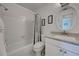 Bright bathroom featuring white fixtures, vanity, and a shower/tub combination at 766 Avenida Estancia # 196, Venice, FL 34292