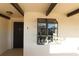 Charming condo entrance with decorative door and unique exterior display case for showcasing collectibles at 766 Avenida Estancia # 196, Venice, FL 34292