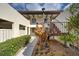 Inviting condo entrance with well-kept landscaping and convenient staircase access to upper levels at 766 Avenida Estancia # 196, Venice, FL 34292