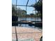 Stunning lake view from the screened pool and patio area at 105 Treviso Ct, North Venice, FL 34275