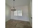 Formal dining room with tile flooring and a charming window at 1219 Nantucket Rd, Venice, FL 34293