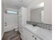 Clean bathroom with a shower/tub combo and white vanity at 127 Nautical Dr, North Port, FL 34287