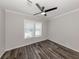 Spacious bedroom with ceiling fan and neutral decor at 127 Nautical Dr, North Port, FL 34287