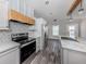 Bright kitchen featuring white cabinets and stylish backsplash at 127 Nautical Dr, North Port, FL 34287