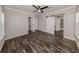 Main bedroom with walk-in closet and barn door entry to en-suite bathroom at 127 Nautical Dr, North Port, FL 34287