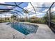 Inviting screened-in pool with a spacious patio area at 13240 Amerigo Ln, Venice, FL 34293