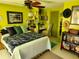 Bright bedroom with starfish bedding and a ceiling fan at 231 Victoria Rd, Venice, FL 34293