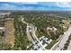 Aerial view of Beachwalk community and surrounding area at 25544 Royal Tern Ln, Englewood, FL 34223