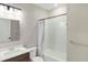 Modern bathroom with shower/tub, vanity, and toilet at 25544 Royal Tern Ln, Englewood, FL 34223