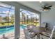 Enjoy dining al fresco by the refreshing pool at 25544 Royal Tern Ln, Englewood, FL 34223