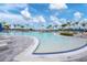 Large resort-style pool with a freeform design at 25544 Royal Tern Ln, Englewood, FL 34223