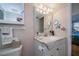 Bright bathroom with updated vanity and fixtures at 250 Santa Maria St # 118, Venice, FL 34285