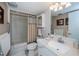 Bathroom with tub, shower, and granite vanity at 250 Santa Maria St # 118, Venice, FL 34285