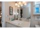 Well-lit bathroom with updated vanity at 250 Santa Maria St # 118, Venice, FL 34285