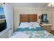 Bedroom offering a king-size bed and a view at 250 Santa Maria St # 118, Venice, FL 34285