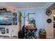 Living room with built-in shelving and media center at 250 Santa Maria St # 118, Venice, FL 34285