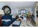 Spacious living room with water views and comfy furniture at 250 Santa Maria St # 118, Venice, FL 34285