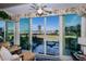 Sunroom with sliding doors and waterfront view at 250 Santa Maria St # 118, Venice, FL 34285